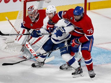 MONTREAL, QUE.: MAY 9, 2015-- Montreal Canadiens defenseman P.K. Subban clears Tampa Bay Lightning center Tyler Johnson from Montreal Canadiens goalie Carey Price  crease during NHL Eastern Conference semifinal action in Montreal on Saturday May 9, 2015.  (Allen McInnis / MONTREAL GAZETTE)