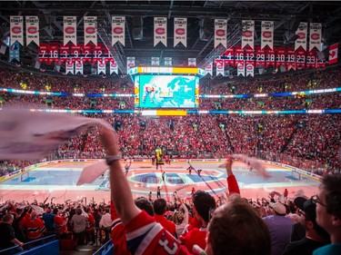 Montreal Canadiens fans cheer as the Canadiens go on the ice before the start of game five of their NHL Eastern Conference semifinal series against the Tampa Bay Lightning at the Bell Centre in Montreal on Saturday, May 9, 2015.