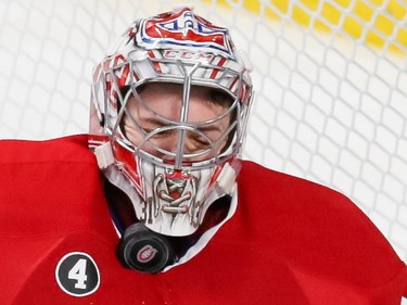 Canadiens goalie Carey Price is hit with a puck during the third period of Game 5 of their NHL Eastern Conference semifinal series against the Tampa Bay Lightning at the Bell Centre in Montreal on May 9, 2015.