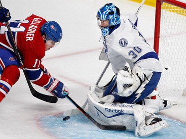 MONTREAL, QUE.: MAY 9, 2015-- Montreal Canadiens right wing Brendan Gallagher gets  pushed and fails to get his stick on the puck as Tampa Bay Lightning goalie Ben Bishop makes the save during NHL Eastern Conference semifinal action in Montreal on Saturday May 9, 2015.  (Allen McInnis / MONTREAL GAZETTE)