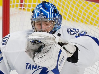 MONTREAL, QUE.: MAY 9, 2015 -- Tampa Bay Lightning goalie Ben Bishop makes a save during the second period of game five of their NHL Eastern Conference semifinal series against the Montreal Canadiens at the Bell Centre in Montreal on Saturday, May 9, 2015. (Dario Ayala / Montreal Gazette)