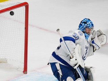 Tampa Bay Lightning goalie Ben Bishop is scored on by Montreal Canadiens right wing P.A. Parenteau, not pictured, during the third period of game five of their NHL Eastern Conference semifinal series at the Bell Centre in Montreal on Saturday, May 9, 2015.