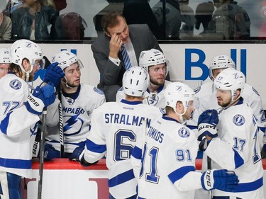 MONTREAL, QUE.: MAY 9, 2015 -- Tampa Bay Lightning head coach Jon Cooper, top, reacts during the third period of game five of their NHL Eastern Conference semifinal series against the Tampa Bay Lightning at the Bell Centre in Montreal on Saturday, May 9, 2015. (Dario Ayala / Montreal Gazette)