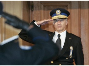 At Montreal City Hall, Marc Parent is sworn in as the new police chief in Montreal on Monday, Sept. 13, 2010.