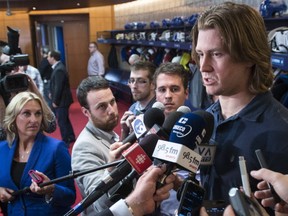 Canadiens defenceman Jeff Petry talks to reporters at the team's practice facility in Brossard on May 14, 2015 as players cleaned out their lockers after the season.
