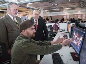 Premier Philippe Couillard visits Framestore in Montreal on Monday, May 25, after announcing a loan by the Quebec government for the expansion of the visual-effects studio.