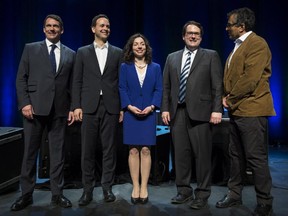 PQ leadership candidates Pierre Karl Péladeau, Alexandre Cloutier, Martine Ouellet, Bernard Drainville and Pierre Céré, left to right, pose for a photograph following the first leadership debate Wednesday, March 11, 2015 in Trois-Rivières, Que.