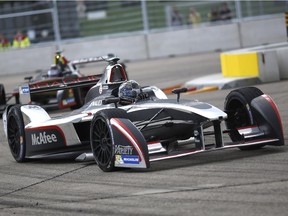 Second placed Jerome D'Ambrosio from Belgium of the Dragon Racing team drives his car during the Formula E Berlin ePrix auto race at the former airport Tempelhof, in Berlin,  May 23, 2015.