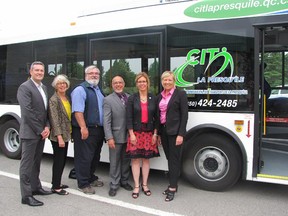 Stéphane Tremblay, with Transbus; from left, Heather Markgraf, community liaison for Vaudreuil MP Jamie Nicholls; Pincourt coucillor and vice-president of CIT La Presqu'Île Jim Miron; Yvan Cardinal, mayor of Pincourt; Manon Charest, CIT La Presqu'Île director general; and Marie-Claude Nichols, Vaudreuil MNA were on hand Monday, MAy 25, for the launch of the MIDI bus.