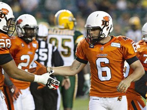 B.C. Lions kicker Ricky Schmitt (6) is congratulated after kicking field goal against the Eskimos during CFL action in Edmonton on  June 13, 2014.