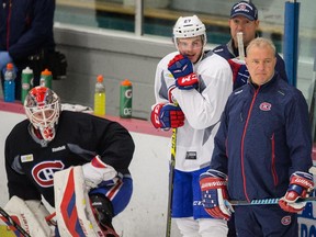 Canadiens head coach Michel Therrien watches players go through practice drill  at the Sports Forum in Tampa, Fla., on May 11, 2015 as they prepare for Game 6 of Eastern Conference semifinal series against the Tampa Bay Lightning.