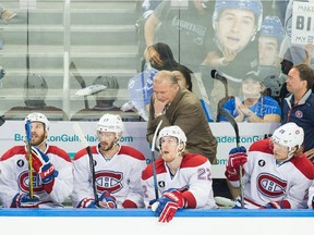 Montreal Canadiens head coach Michel Therrien, centre standing, reacts to the Canadiens score during the third period of game six of their NHL Eastern Conference semifinal series against the Tampa Bay Lightning at Amalie Arena in Tampa, Florida on Tuesday, May 12, 2015.