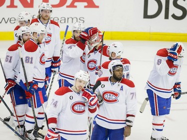 Montreal Canadiens players react after being eliminated from the playoffs by the Tampa Bay Lightning in Game 6 of their NHL Eastern Conference semifinal series at Amalie Arena in Tampa, Fla., on Tuesday, May 12, 2015.