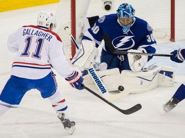 Montreal Canadiens right wing Brendan Gallagher attempts a shot against Tampa Bay Lightning goalie Ben Bishop during the first period of Game 6 of their NHL Eastern Conference semifinal series at Amalie Arena in Tampa, Fla., on Tuesday, May 12, 2015.
