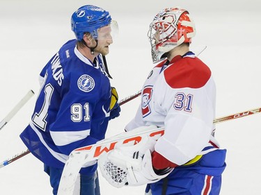 Tampa Bay Lightning centre Steven Stamkos, left, shakes hands with Montreal Canadiens goalie Carey Price after the Lightning eliminated the Canadiens from the playoffs in Game 6 of their NHL Eastern Conference semifinal series at Amalie Arena in Tampa, Fla., on Tuesday, May 12, 2015.