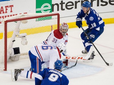Tampa Bay Lightning left wing Ondrej Palat, right, scores on Montreal Canadiens goalie Carey Price during the second period of Game 6 of their NHL Eastern Conference semifinal series at Amalie Arena in Tampa, Fla., on Tuesday, May 12, 2015.