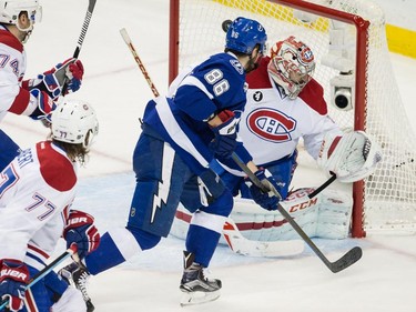 Tampa Bay Lightning right wing Nikita Kucherov, scores on Montreal Canadiens goalie Carey Price during the first period of Game 6 of their NHL Eastern Conference semifinal series at Amalie Arena in Tampa, Fla., on Tuesday, May 12, 2015.