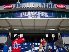 A Canadiens fan arrives at the Amalie Arena before the start of Game 3 of NHL Eastern Conference semifinal series against the Tampa Bay Lightning on May 6, 2015.