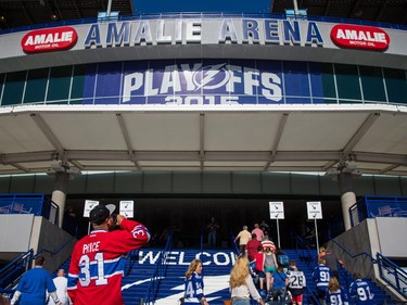 A Montreal Canadiens fan arrives at the Amalie Arena before the start of game three of the NHL eastern conference semi-final hockey series between the Montreal Canadiens and the Tampa Bay Lightning in Tampa on Wednesday, May 6, 2015.