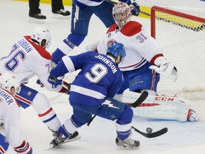 Tampa Bay Lightning centre Tyler Johnson scores the game-winning goal against Canadiens goalie Carey Price in the last second of play during Game 3 of Eastern Conference semifinal series on May 6, 2015.