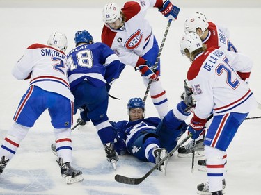 Tampa Bay Lightning defenceman Mark Barberio as Lightning and Montreal Canadiens players fight for the puck during the first period of game four of their NHL eastern conference semi-final hockey series at Amalie Arena in Tampa on Thursday, May 7, 2015.