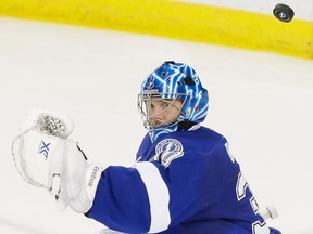 The puck flies past Tampa Bay Lightning goalie Ben Bishop on a shot from the Canadiens' David Desharnais that ended up in the net for a goal during Game 4 of Eastern Conference semifinal in Tampa, Fla., on May 7, 2015. The Canadiens won the game 6-2.