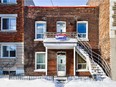 The exterior of a four-bedroom cottage in the Southwest borough, on the market for $339,000.