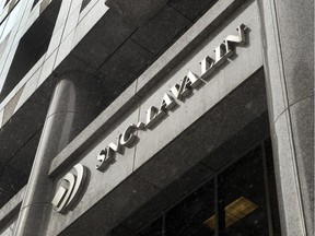 The head office of SNC Lavalin are seen Thursday, February 19, 2015 in Montreal. The RCMP has laid fraud and corruption charges against Montreal-based engineering firm SNC-Lavalin and two of its subsidiaries.