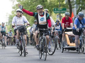Cyclists participate in the annual Tour de l'Île in Montreal, Sunday, June 1, 2014.
