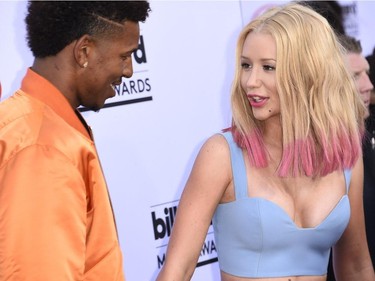 Professional basketball player Nick Young and Iggy Azalea attend the 2015 Billboard Music Awards, May 17, 2015, at the MGM Grand Garden Arena in Las Vegas, Nevada.