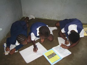 High school girls study in poor conditions in Zambia. More than 30 per cent of primary-aged girls in the region don't attend school at all.