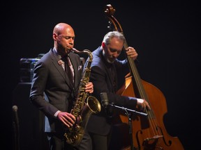 Joshua Redman plays the saxophone with Reid Anderson on bass at the 2015 Montreal International Jazz Festival. (Peter McCabe / MONTREAL GAZETTE)