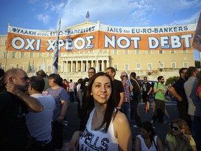 Demonstrators during a rally  in Athens, Greece, 29 June 2015. Greek voters will decide in a referendum next Sunday on whether their government should accept an economic reform package put forth by Greece's creditor. Greece has imposed capital controls with the banks being closed until the referendum.