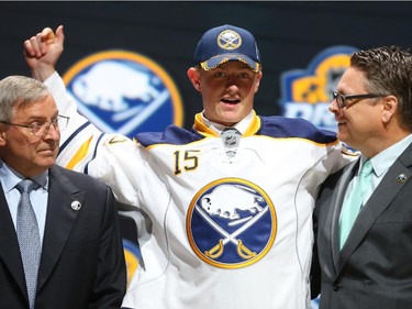 Jack Eichel poses on stage after being selected second overall by the Buffalo Sabres in the first round of the 2015 NHL Draft on June 26, 2015 in Sunrise, Florida.