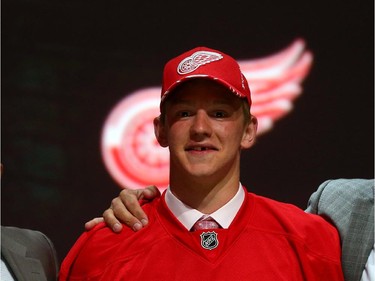 Evgeny Svechnikov poses after being selected 19th overall by the Detroit Red Wings in the first round of the 2015 NHL Draft on June 26, 2015 in Sunrise, Florida.
