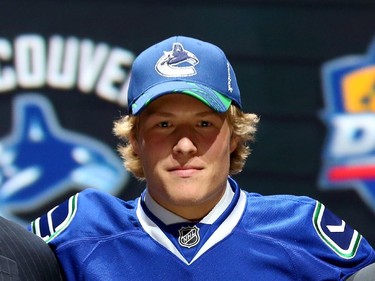 Brock Boeser poses after being selected 23th overall by the Vancouver Canucks in the first round of the 2015 NHL Draft on June 26, 2015 in Sunrise, Florida.