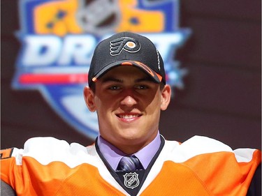 Travis Konecny poses after being selected 24th overall by the Philadelphia Flyers in the first round of the 2015 NHL Draft on June 26, 2015 in Sunrise, Florida.