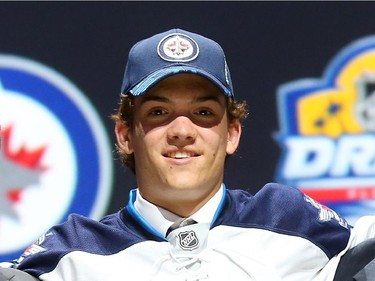 Jack Roslovic poses after being selected 25th overall by the Winnipeg Jets in the first round of the 2015 NHL Draft on June 26, 2015 in Sunrise, Florida.