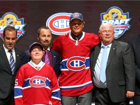 Noah Juulsen poses after being selected 26th overall by the Canadiens in the first round of the 2015 NHL Draft on June 26, 2015 in Sunrise, Fla.