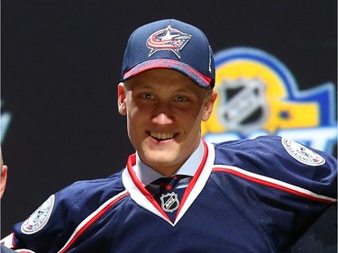 Gabriel Carlsson poses after being selected 29th overall by the Columbus Blue Jackets in the first round of the 2015 NHL Draft on June 26, 2015 in Sunrise, Florida.
