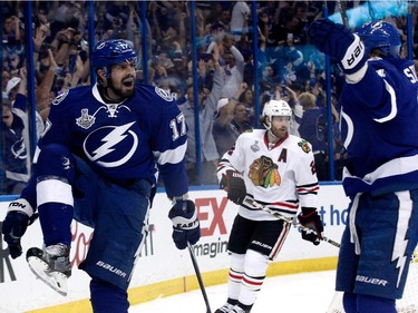 Alex Killorn #17 of the Tampa Bay Lightning celebrates with Steven Stamkos #91 after scoring his first period goal against the Chicago Blackhawks during Game One of the 2015 NHL Stanley Cup Final at Amalie Arena on June 3, 2015 in Tampa, Florida.