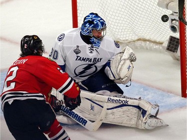 Duncan Keith #2 of the Chicago Blackhawks scores a goal in the second period against Ben Bishop #30 of the Tampa Bay Lightning during Game Six of the 2015 NHL Stanley Cup Final at the United Center  on June 15, 2015 in Chicago, Illinois.