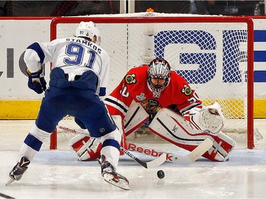 Steven Stamkos #91 of the Tampa Bay Lightning takes a shot on Corey Crawford #50 of the Chicago Blackhawks during the second period in Game Six of the 2015 NHL Stanley Cup Final at the United Center  on June 15, 2015 in Chicago, Illinois.