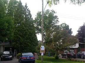 A couple in Beaconsfield are fighting the installation of what is called a small cell receiver on hydro pole, pictured, near the bedroom window of their five-year-old twins.