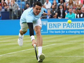 LONDON, ENGLAND - JUNE 15:  Milos Raonic of Canada volleys in his men's singles first round match against James Ward of Great Britain during day one of the Aegon Championships at Queen's Club on June 15, 2015 in London, England.