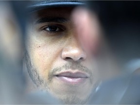 Mercedes driver Lewis Hamilton speaks to the press after finishing third at the Monaco Grand Prix on May 24, 2015.