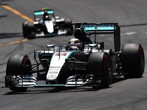 Mercedes driver Lewis Hamilton drives ahead of teammate Nico Rosberg at the Monaco Grand Prix in Monte Carlo on May 24, 2015.