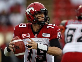 Stampeders quarterback Bo Levi Mitchell looks for a receiver during CFL pre-season game against the B.C. Lions in Calgary on June 12, 2015.