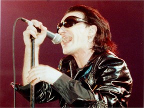 BONOOLD, U2's Bono belts out the tunes at the Forum Monday, Gsxette phot Allen McInnis March 22-92.