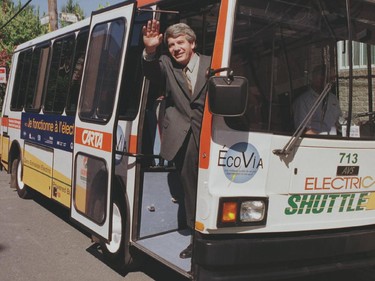 Jean Doré waves goodbye as he embarks on journey aboard electric bus on September 19, 1998.